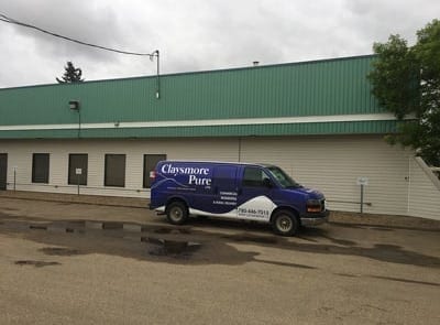 Claysmore Pure company van in front of Claysmore Pure Ltd. location