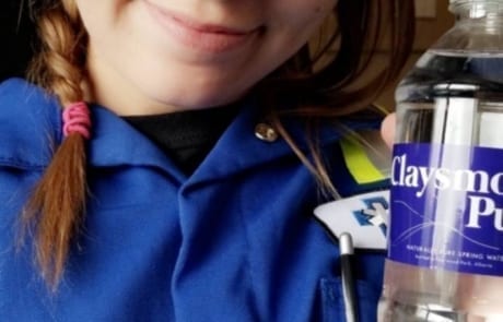 Claysmore Pure fan modelling the bottles in use when she works as a paramedic saving lives, we appreciate what you do!