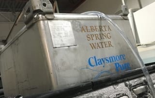 Bulk Claysmore Spring Water picked up from our Store. We can fill tanks like this for you or deliver bulk water for home drinking and cooking.