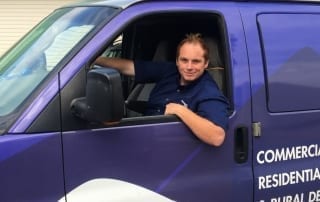 Callum in the drivers seat ready to serve you at home or at work with Albertas Best Spring Water.